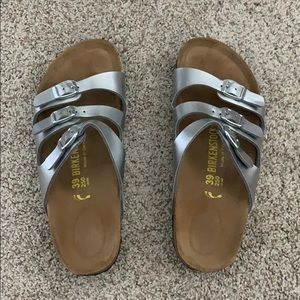 Three Strap Silver Birkenstock’s. Never worn